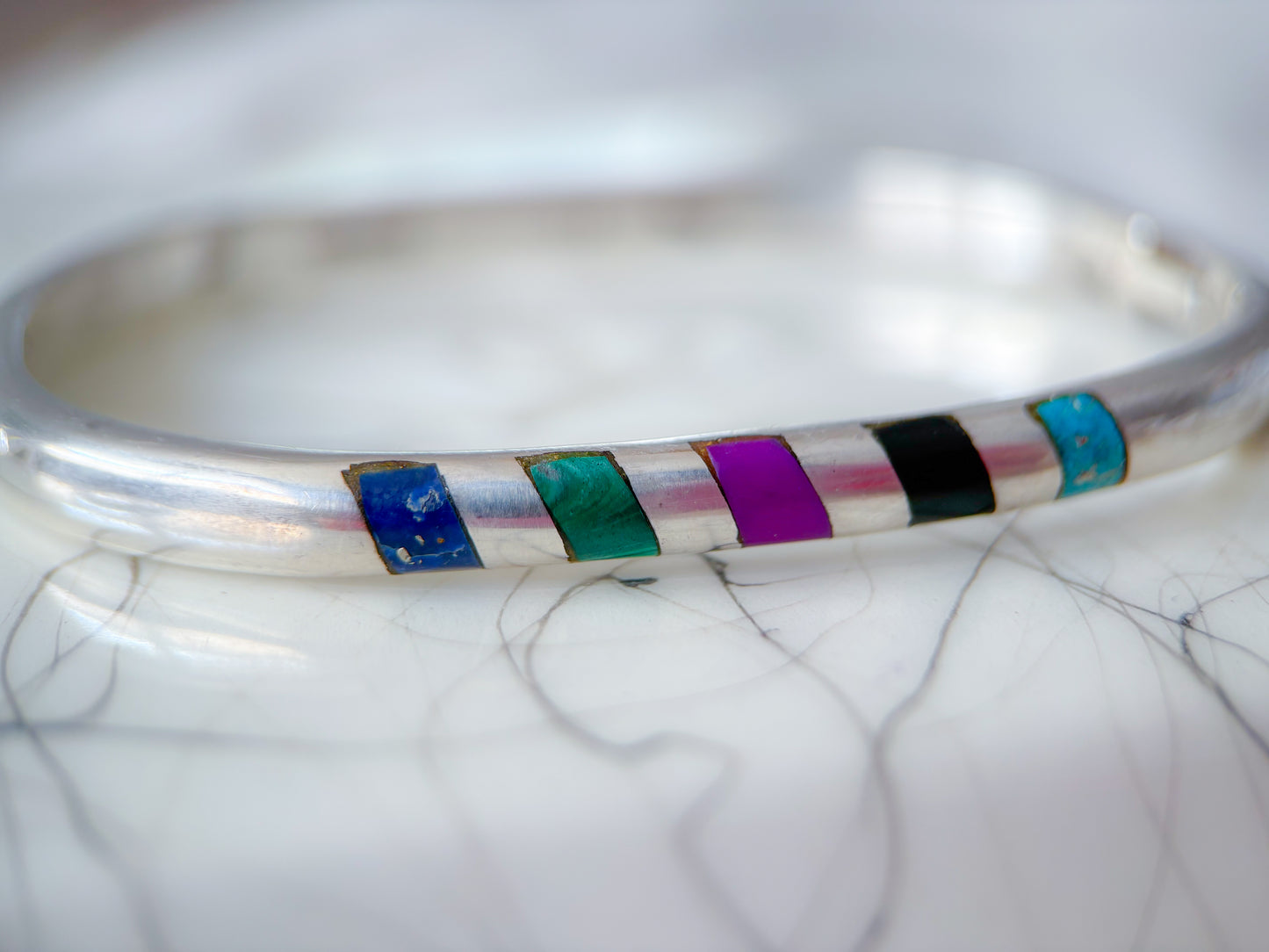 Vintage Taxco Sterling Silver Oval Bangle with Multicolored Gemstone Inlay, circa 1970s