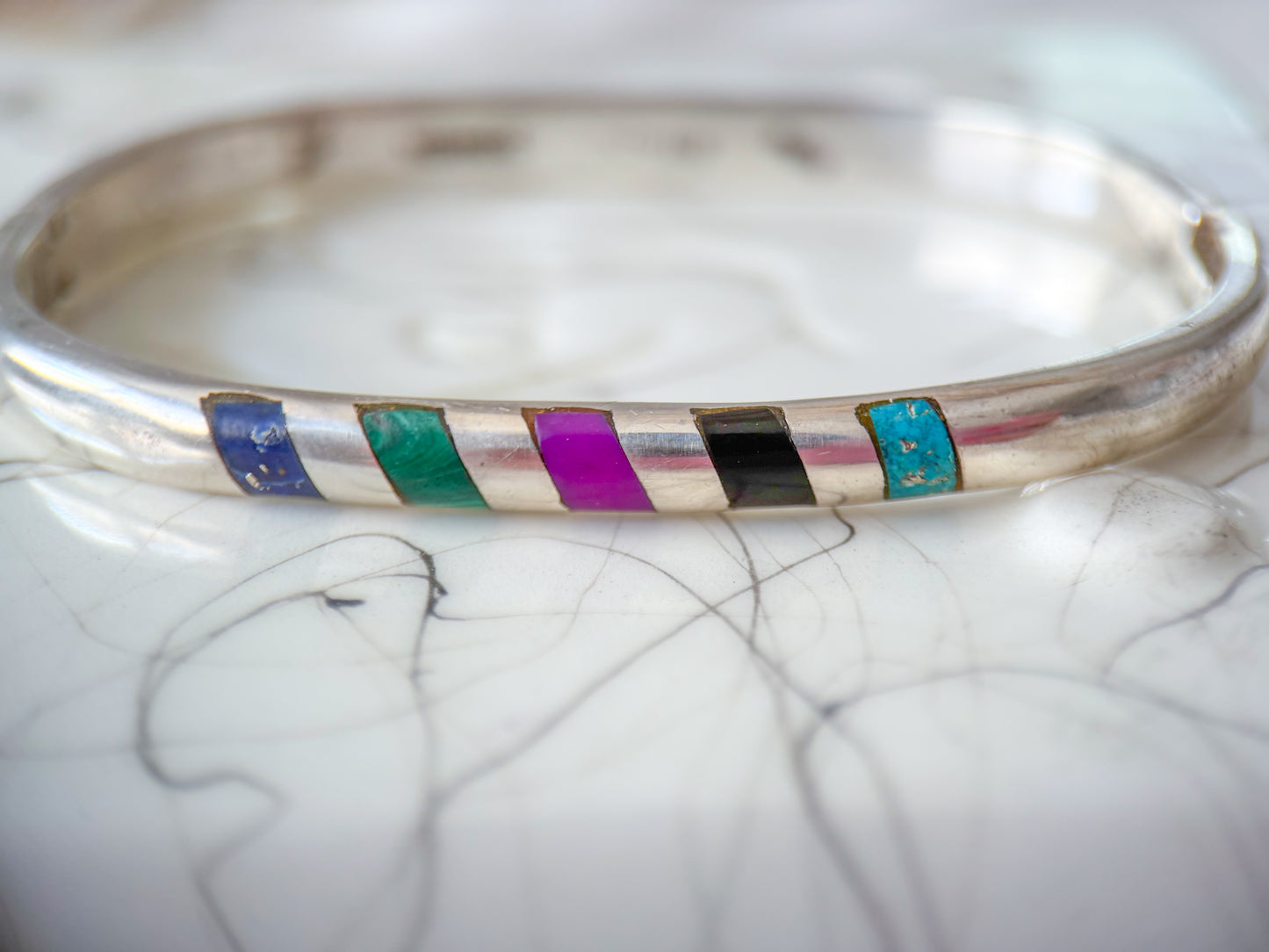 Vintage Taxco Sterling Silver Oval Bangle with Multicolored Gemstone Inlay, circa 1970s