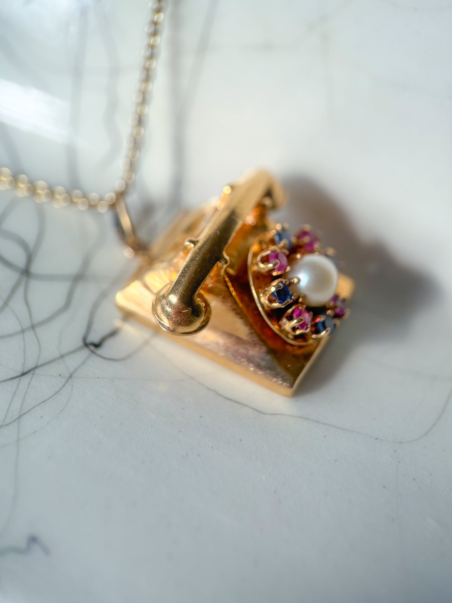 Vintage Telephone with Natural Rubies, Sapphires and a Pearl 14k Yellow Gold Charm