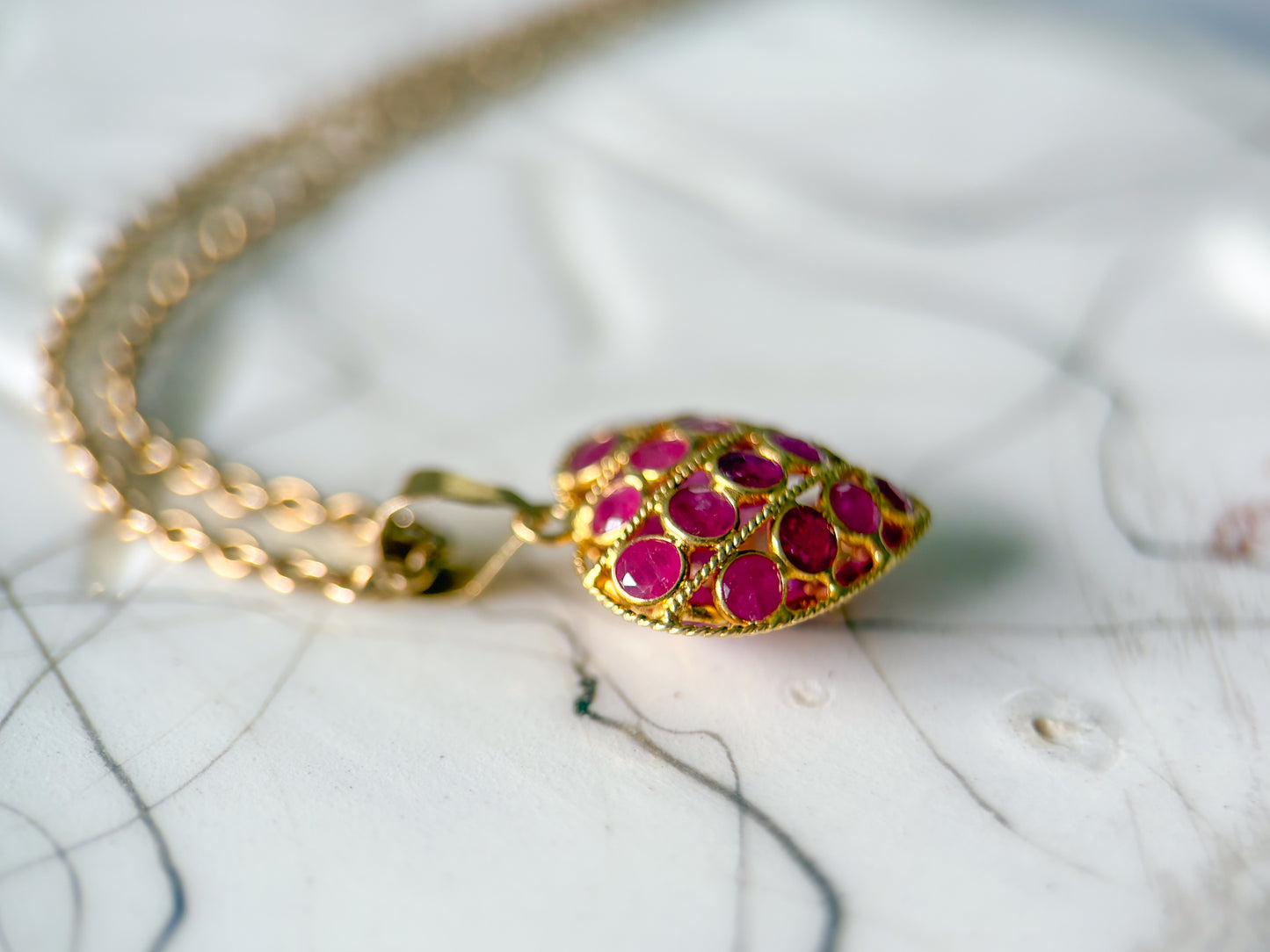 Vintage Natural Ruby Puffy Heart 18k Yellow Gold Charm, Circa 1990's