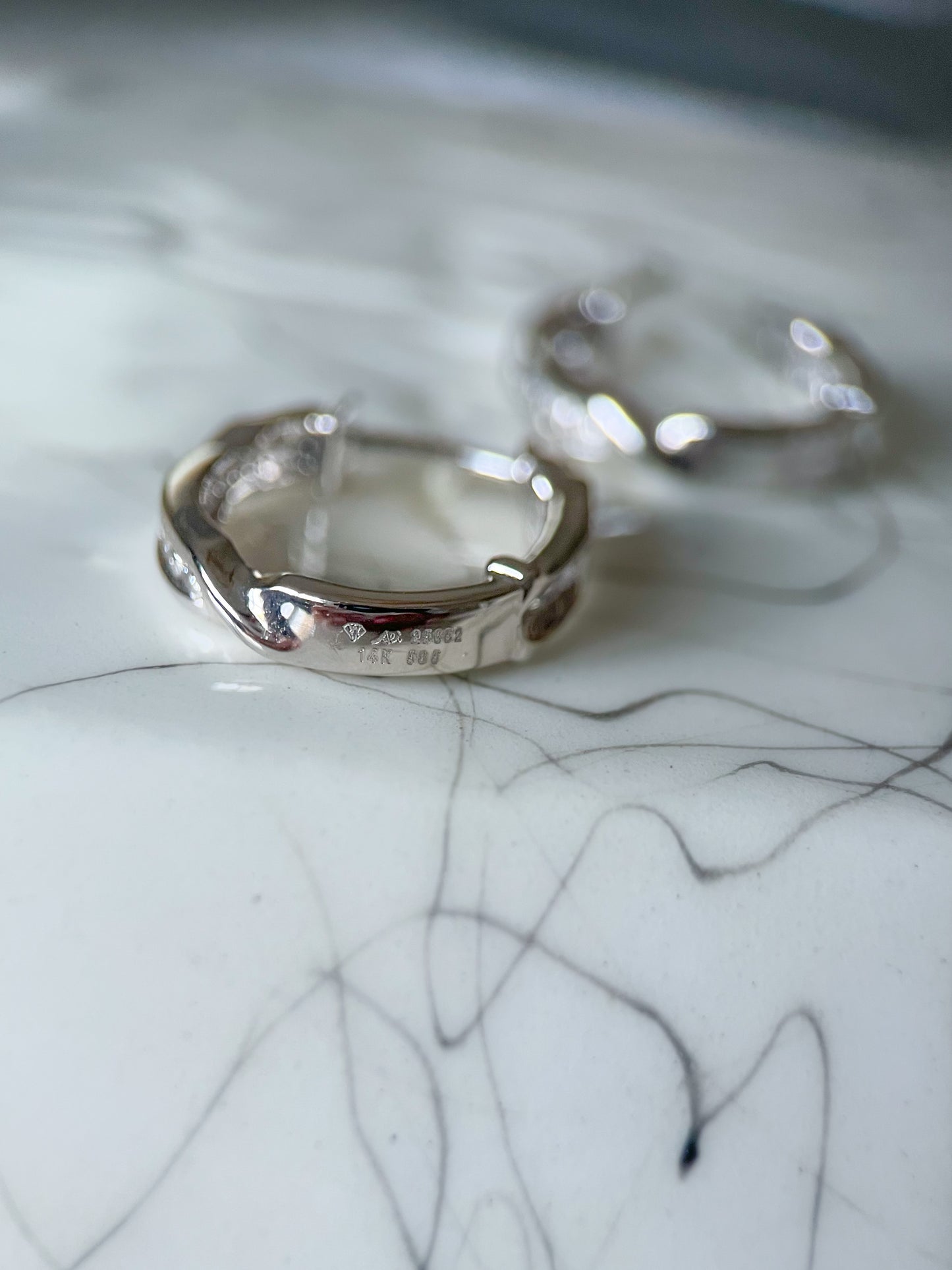 Natural Diamond 14k White Gold Twist Oval Hoop Earrings