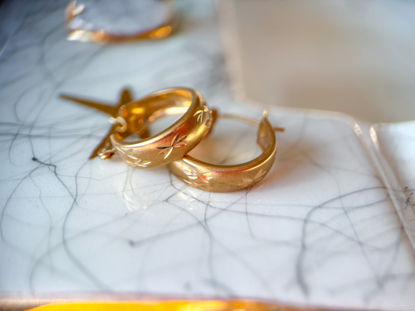 Vintage 14k Yellow Gold Huggies with Star Detailing